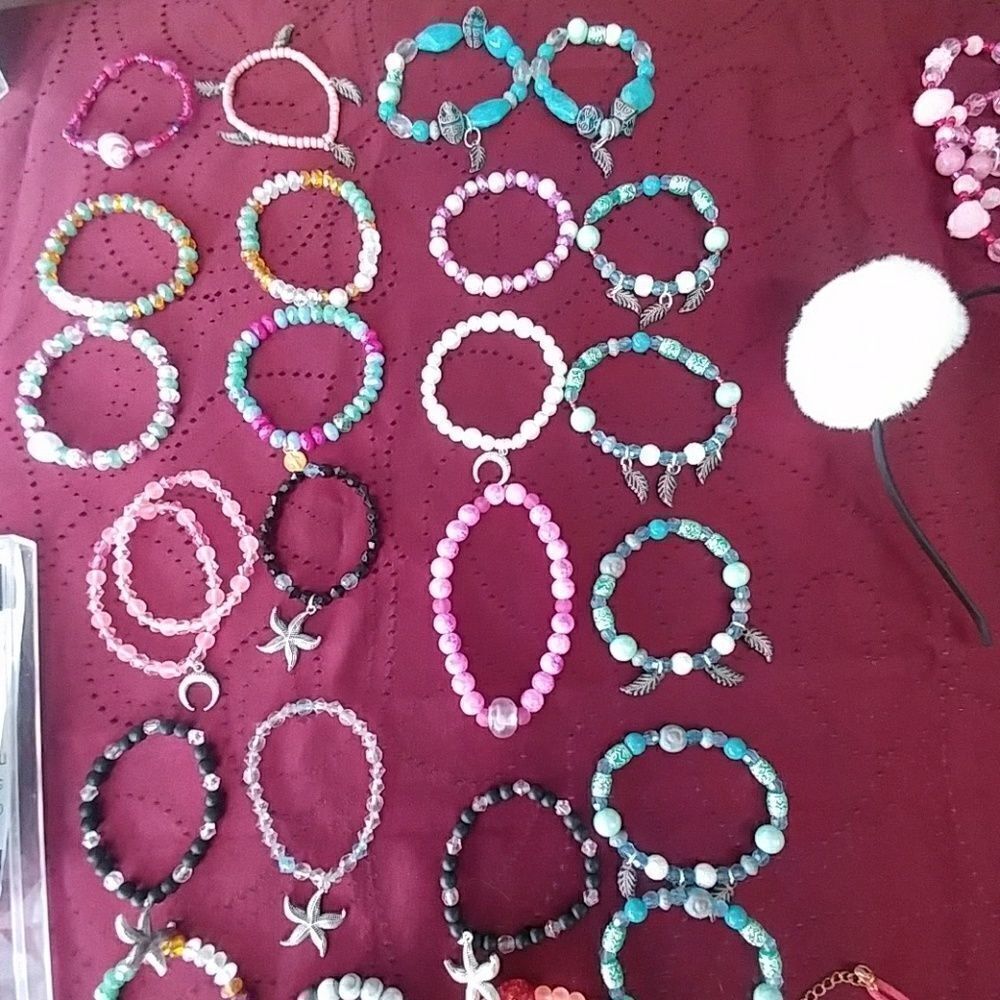 2for$14:Feather charm bracelet  